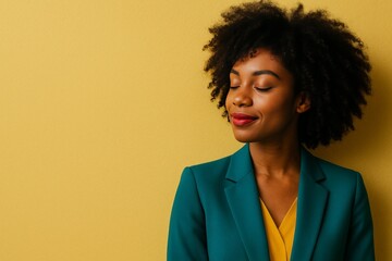 Black woman with curly hair in teal blazer on yellow background, serene portrait with eyes closed