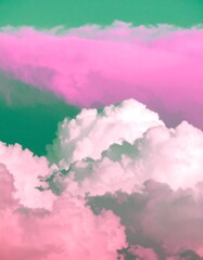 Naklejka premium Vibrant cloudscape in hues of pink and green