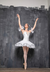 Studio portrait of a ballerina in a white tutu