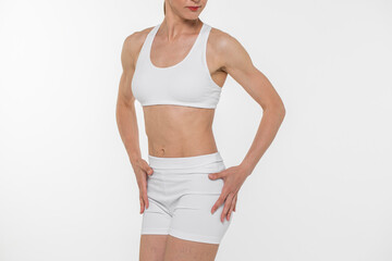 Fitness female body, isolated on white background