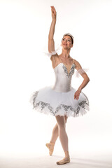 Naklejka premium Studio portrait of a ballerina in a white tutu