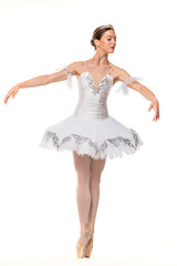 Naklejka premium Studio portrait of a ballerina in a white tutu