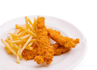 Crispy chicken or shrimp tenders with golden fries served on a white plate