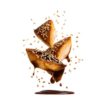 Floating delicious tofu in teriyaki sauce with sesame seeds on transparent background