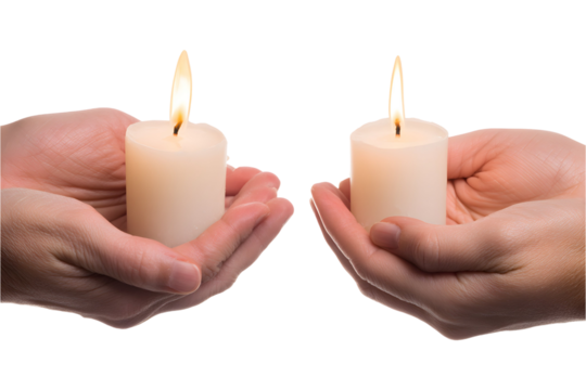 Two hands holding lit candles in the dark, representing hope, faith, or remembrance