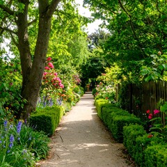 Naklejka premium Lush garden path lined with vibrant flowers and greenery