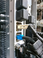 Detailed view of a network device showing multiple network ports and connectors for data transfer.
