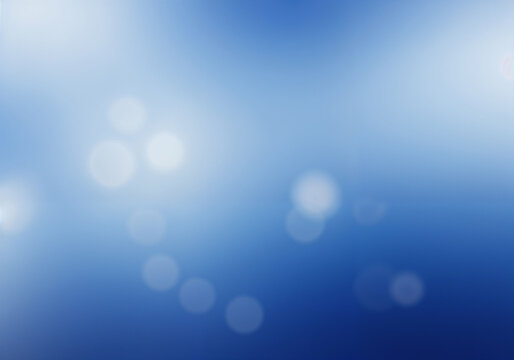 Blue bokeh backdrop shows diffused light and blurred spots provides soft look