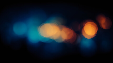 Abstract bokeh light texture with orange and blue circular blurs on dark background. Defocused city night lights for overlay or backdrop.