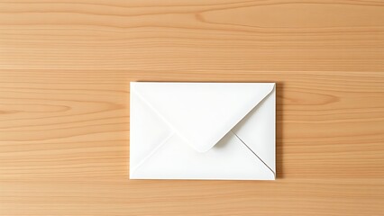 Minimalist white envelope on wooden surface, conveying simplicity and communication under soft lighting.