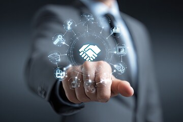 Businessperson interacts with a digital interface showing a handshake surrounded by various business icons, symbolizing collaboration and networking