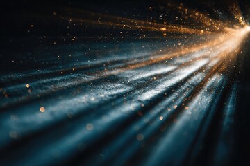 Golden light rays on dark surface