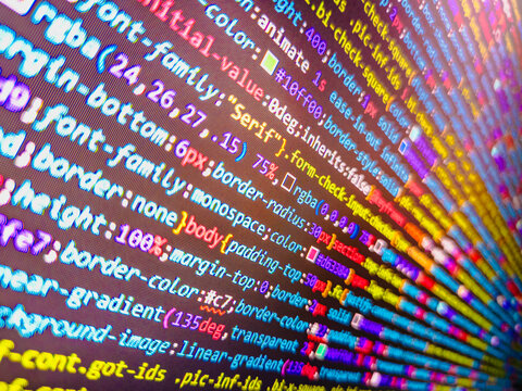 Binary computer code background, abstract. HTML website structure. Binary with Skull Screen, Wannacry, Ransomware Virus Background. Real Java Script code developing screen