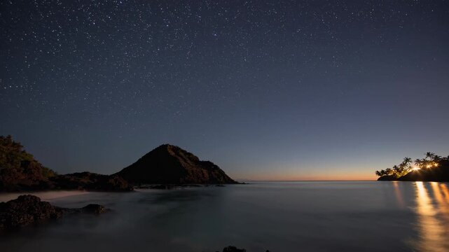 Stunning Nighttime Coastal Scene in Samoa with Starry Sky and Silhouetted Islands Reflecting in Calm Ocean Waters, Capturing Tranquility and Natural Beauty
