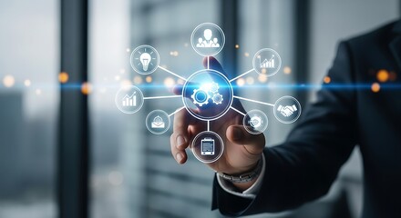 A businessman interacting with digital icons representing business processes and operations online