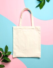 Blank tote bag on colorful background