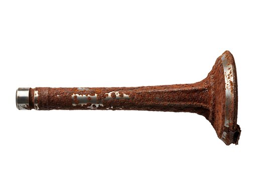 Close-up shot of a single used and rusty engine intake valve against a clean white backdrop.
