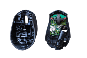 Computer mouse opened up for repair and servicing