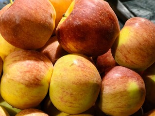 Fresh apples for sale at the market delicious healthy apples red and yellow apples fruit harvest time