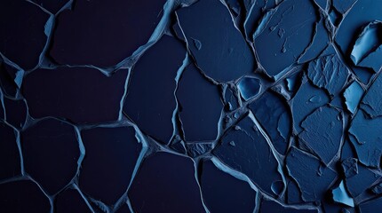 Stunning deep blue shattered stone surface creating a modern textured background perfect for design projects or artistic presentations