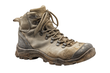 Worn and rugged hiking boot for adventurous outdoor trekking and climbing expeditions in nature on transparent background