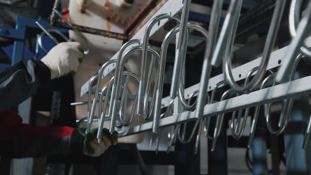 Electroplating. A production line for coating with a protective layer of metal. Corrosion and rust protection	
