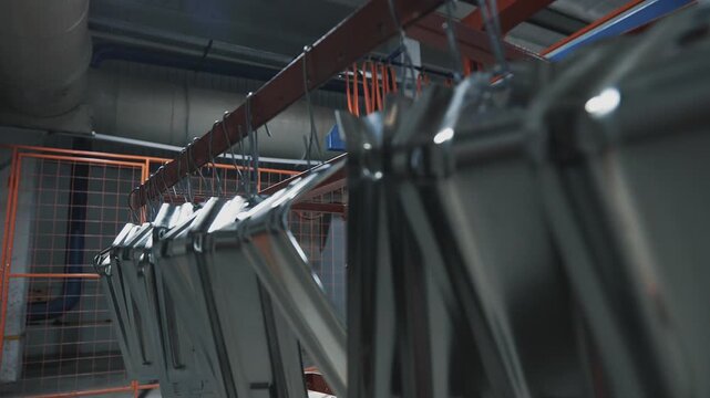 Electroplating. A production line for coating with a protective layer of metal. Corrosion and rust protection	
