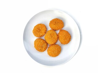 Crispy fried chicken nuggets on white plate isolated on white background, Flat lay 