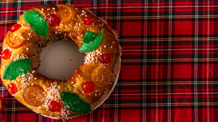 Traditional Rosca de Reyes Cake on Red Plaid