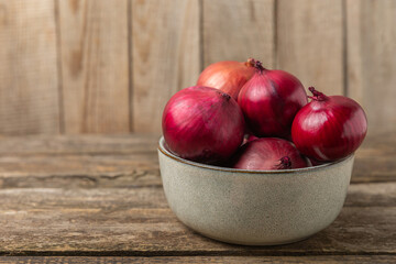 Shallot onion on the kitchen table. onion slice. onion rings. Fresh red Onion. Natural, fresh, vegetarian food. Agricultural products. Healthy eating. Vegetables. Farmer's market.
