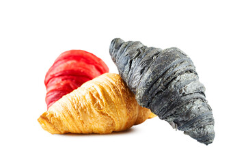 Red, black and classic croissants isolated on white background.