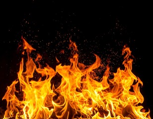 Fototapeta premium Fiery flames against a dark background