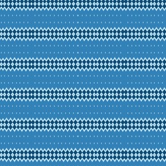 Minimalist geometric seamless pattern with horizontal rows of zigzag lines and diamond motifs in a cool blue color palette