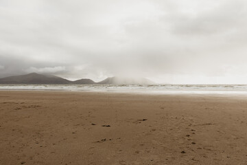  Misty Beach Landscape with Mountains and Sea