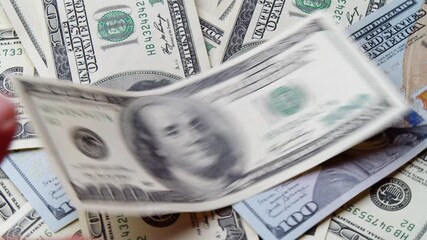 Shot Captures The Essence Of Economic Power. A Rotating Pile Of Us Dollars Symbolizes Cash Flow, Return On Investment, Income Streams, Corporate Success And Financial Freedom. - Powered by Adobe