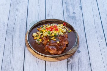 homemade pork steck with vegetable in plate
