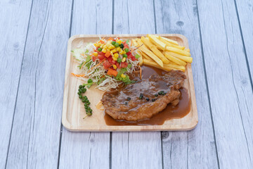 homemade pork steck with vegetable in plate