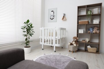 Baby's room with crib and toys. Interior design