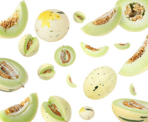 Tasty ripe melons swirling in air against white background
