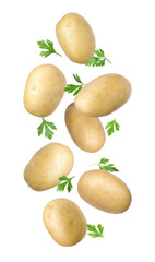 Fresh raw potatoes with parsley falling on white background