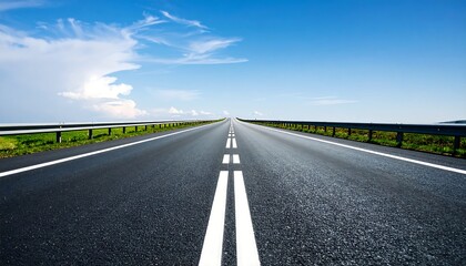 Fototapeta premium Empty highway stretches into a bright blue sky