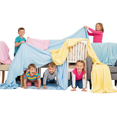 Children Building Indoor Blanket Fort with Furniture and Teamwork