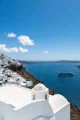 White architecture in Santorini island, Greece. Blue sea and the blue sky at sunny day.