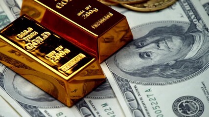 Rotating Gold Bitcoins Resting On One Hundred Dollar Notes Represent The Shift To Blockchain Economy, Digital Payments, And Online Financial Transactions Worldwide. - Powered by Adobe