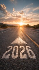 Road with Arrow and 2026 Text Leading to Sunrise