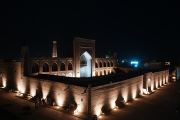 Fototapeta premium Mohammed Rakhim Khan Madrassah and Walled Fortress known as Itchan Kala in Khiva, Uzbekistan - ウズベキスタン ヒヴァ イチャン カラ ムハンマド・ラヒム・カーン・マドラサ 