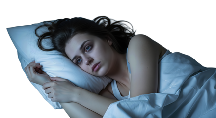 Woman lying awake in bed, deep in thought, struggling with insomnia, stress, and anxiety during the night