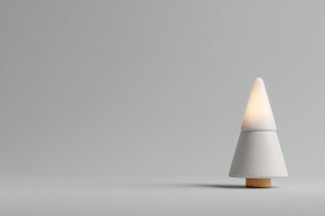 minimalist christmas tree stands elegantly on clean white background radiating soft light