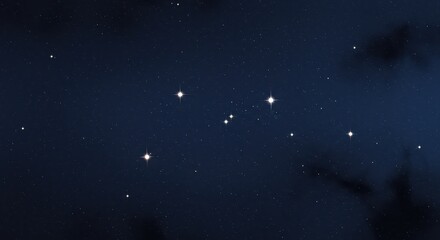 Naklejka premium Night sky with bright stars and dark clouds in the background 
