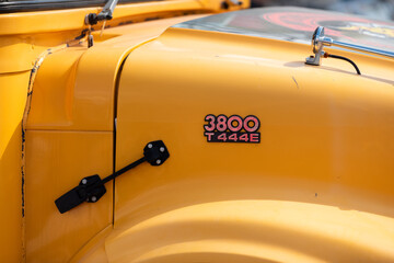 Detail from yellow bus of moto club 